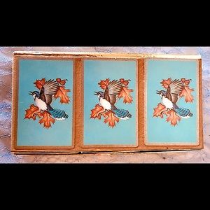 Boxed set of three decks of vintage playing cards